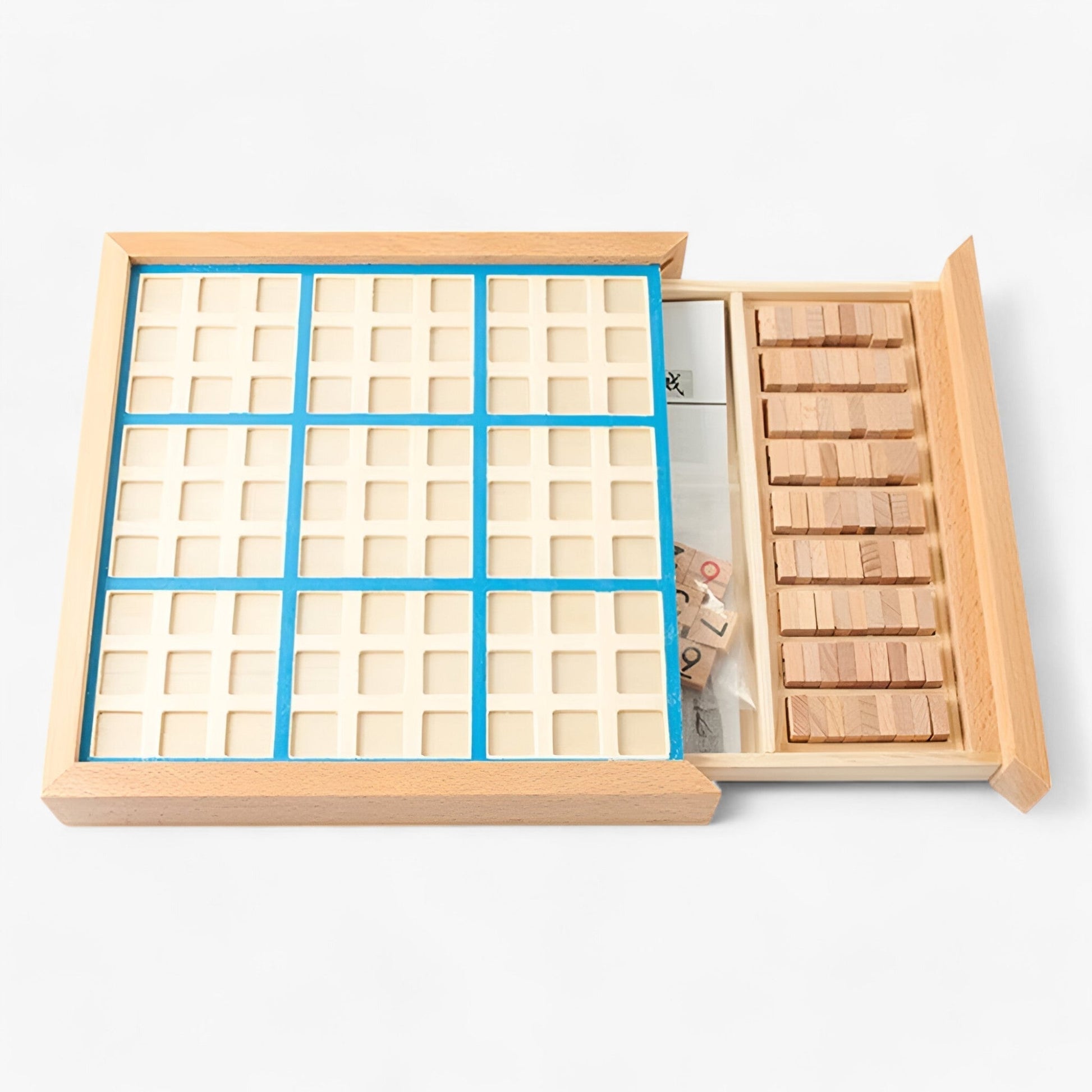 Fitlybuy wooden Sudoku board with a blue grid, open storage drawer for wooden number tiles, and instruction booklet.