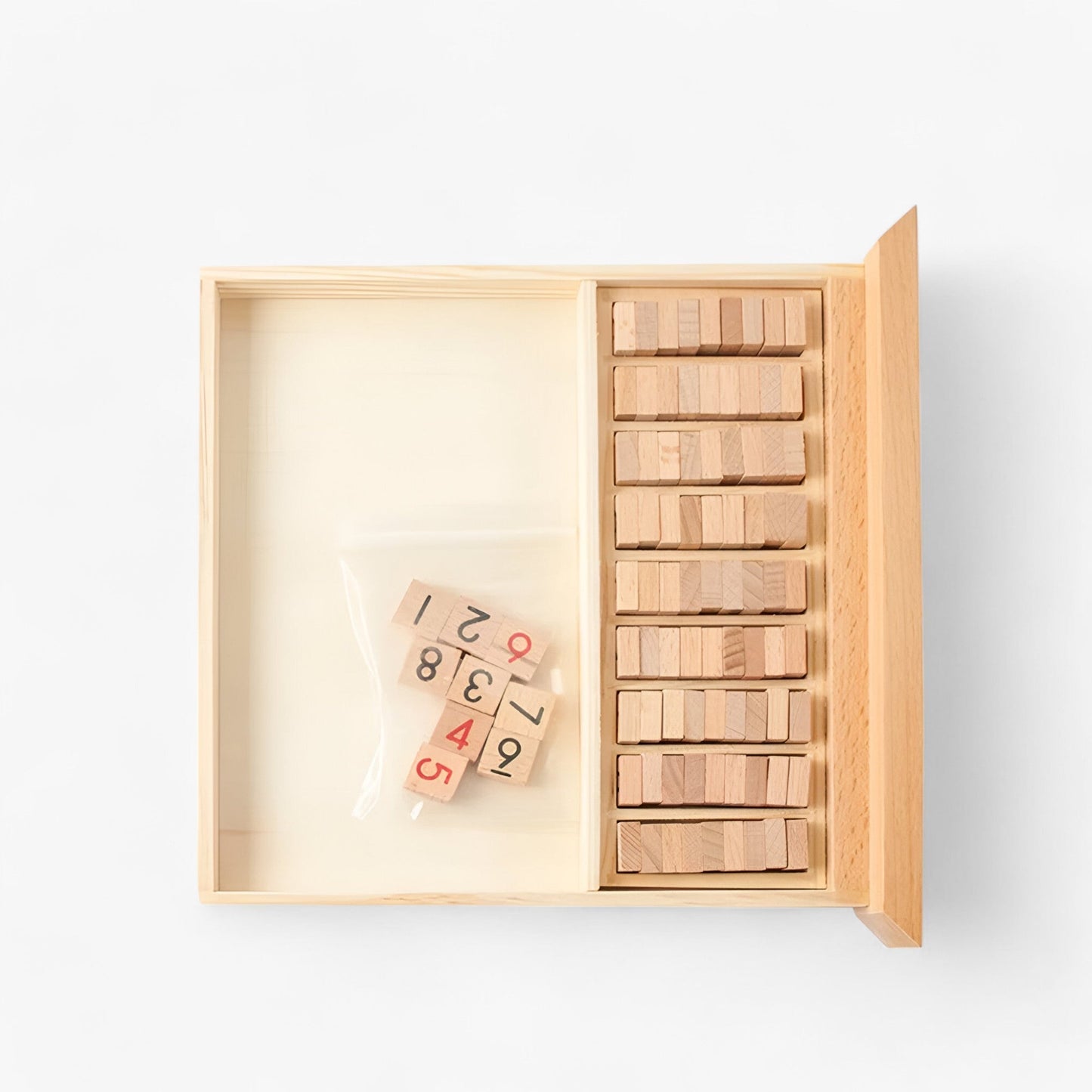 Fitlybuy wooden Sudoku board with a pull-out drawer, organized number tiles, and spare pieces in a plastic bag.