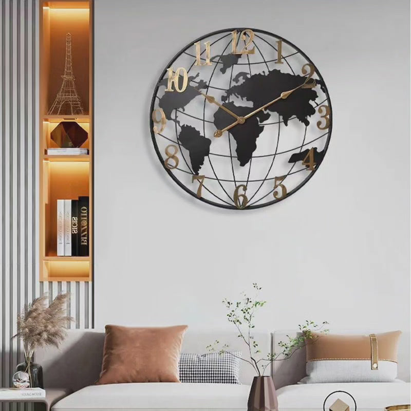 Fitlybuy 60cm black world map wall clock with gold numerals and hands, displayed on a modern living room wall.