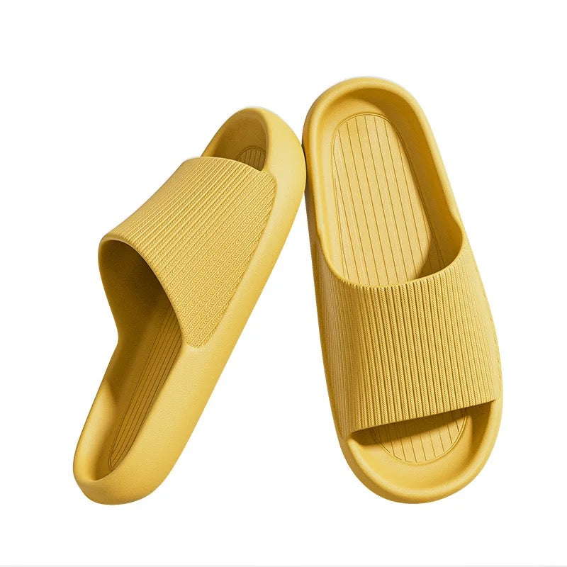 Yellow Fitlybuy Cloud Slides with a thick-sole ComfortFoam cushion design and ribbed texture on a white background.
