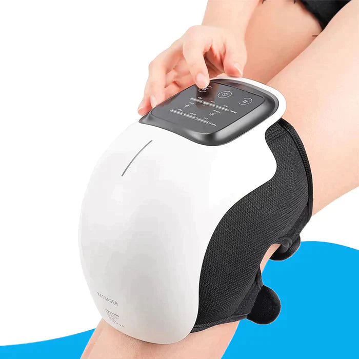 Fitlybuy white and black knee massager with infrared heat, digital touch controls, secured on a leg.