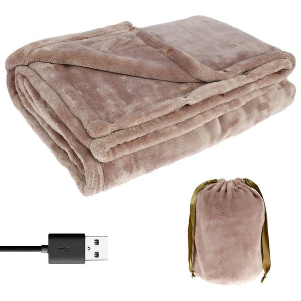 Folded taupe flannel USB-rechargeable electric blanket with a matching storage pouch and USB charging cable.