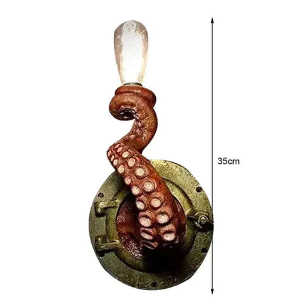 Fitlybuy Krakenna bronze porthole wall light with a textured octopus tentacle holding a light bulb. 35cm tall.