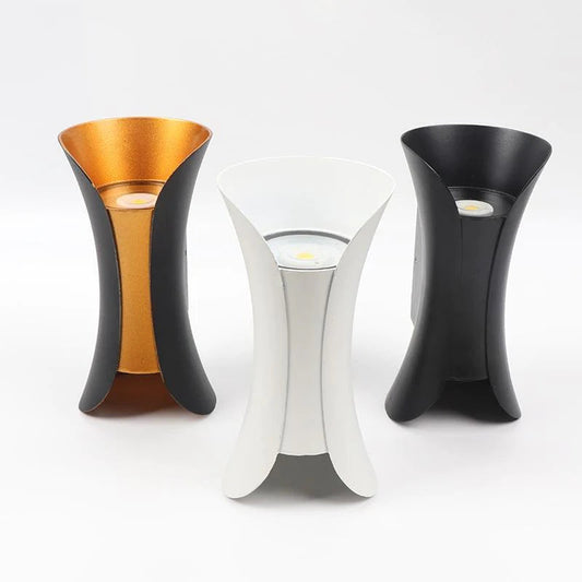 Three Fitlybuy Lumio modern LED wall lights in black/gold, white, and black with a curved, waterproof, durable design.