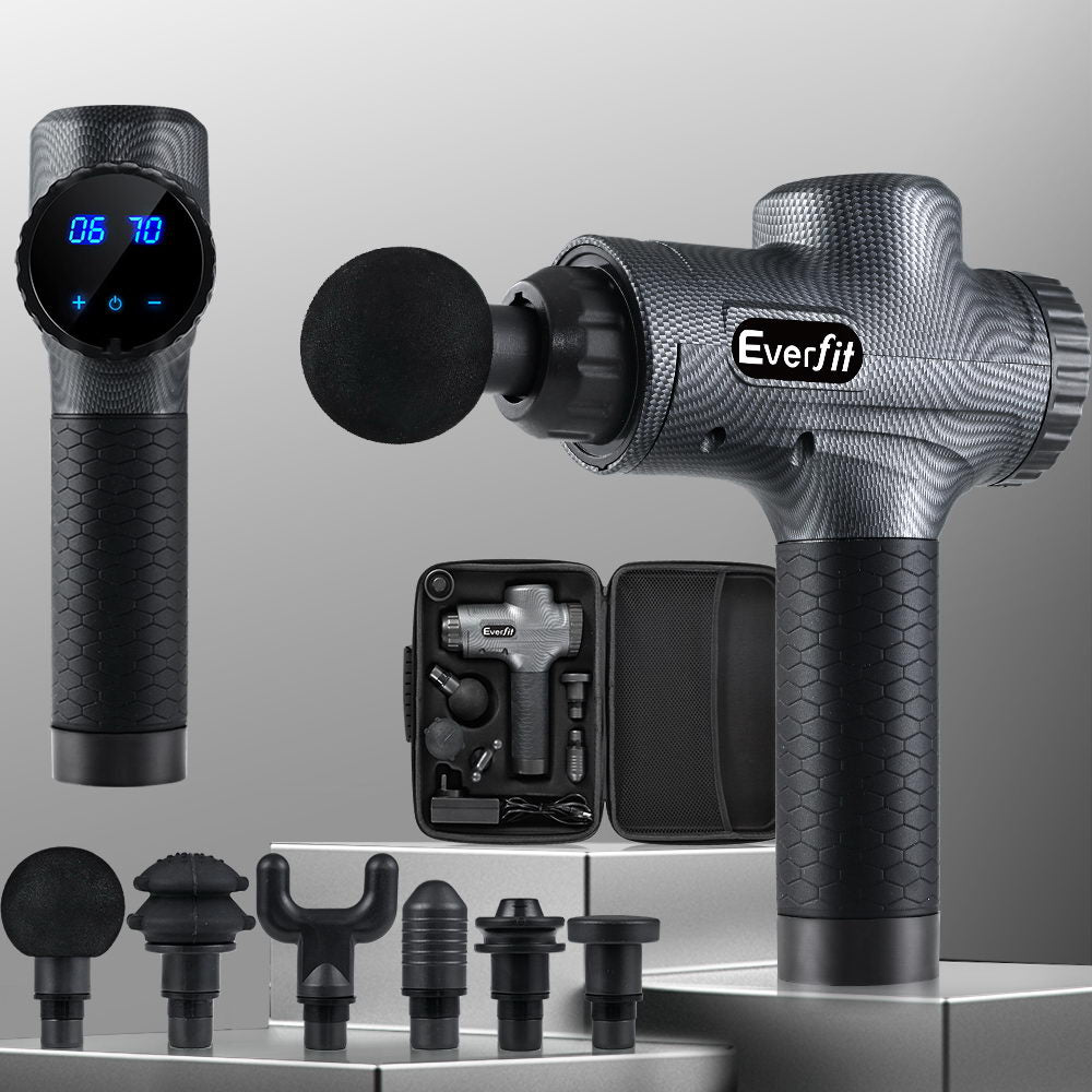 Massmaster Everfit grey massage gun with digital display, 6 heads, and carrying case on a silver pedestal.