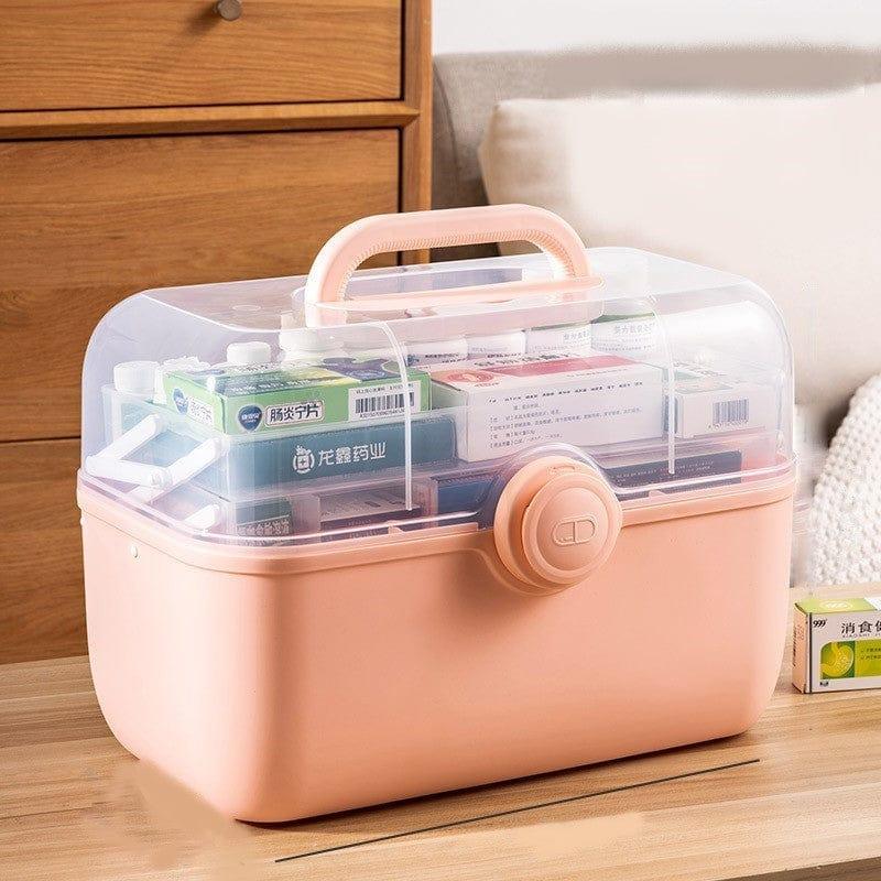Fitlybuy MediSmart: A portable, peach-colored medicine storage box with a clear lid, handle, and secure latch.