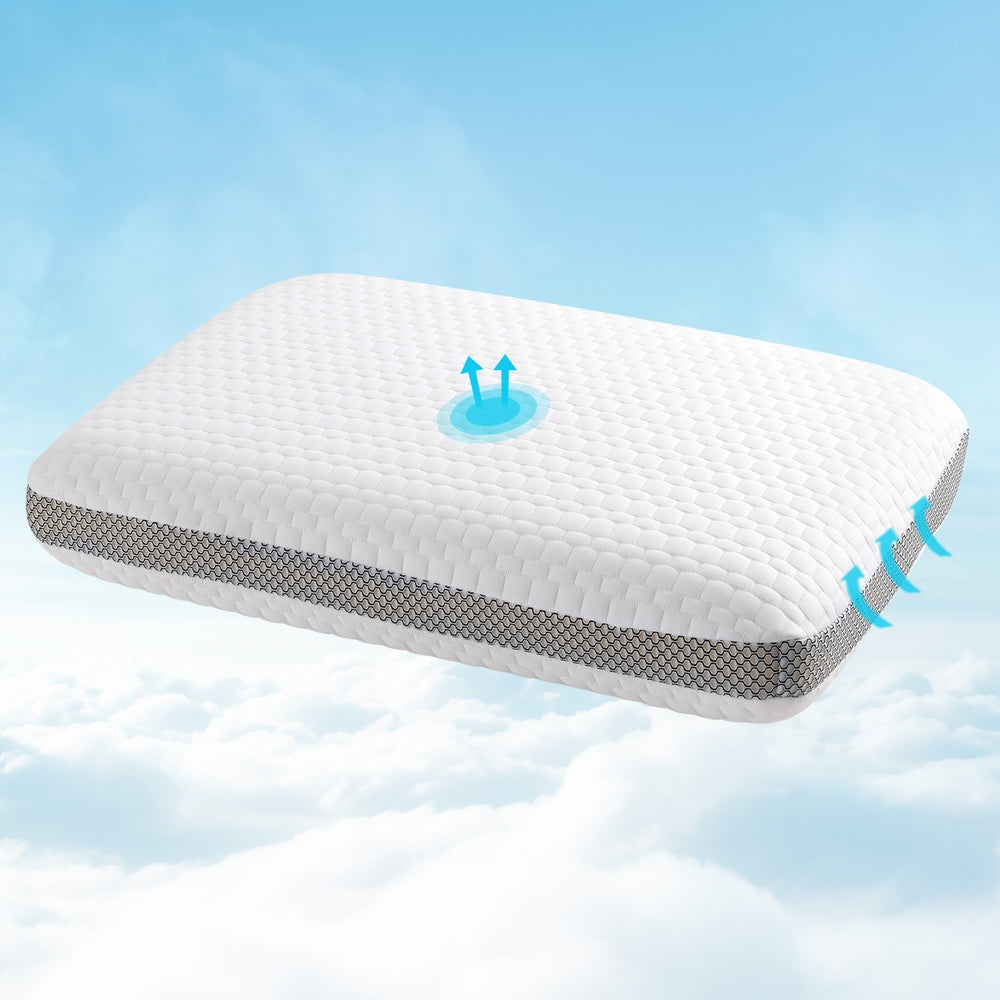 White Fitlybuy luxury memory foam pillow with a grey mesh side panel floating against a blue sky with clouds.