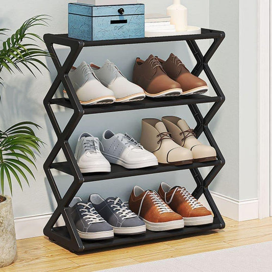 Fitlybuy black 4-tier minimalist shoe rack with an X-frame design, holding various shoes in a bright home entryway.