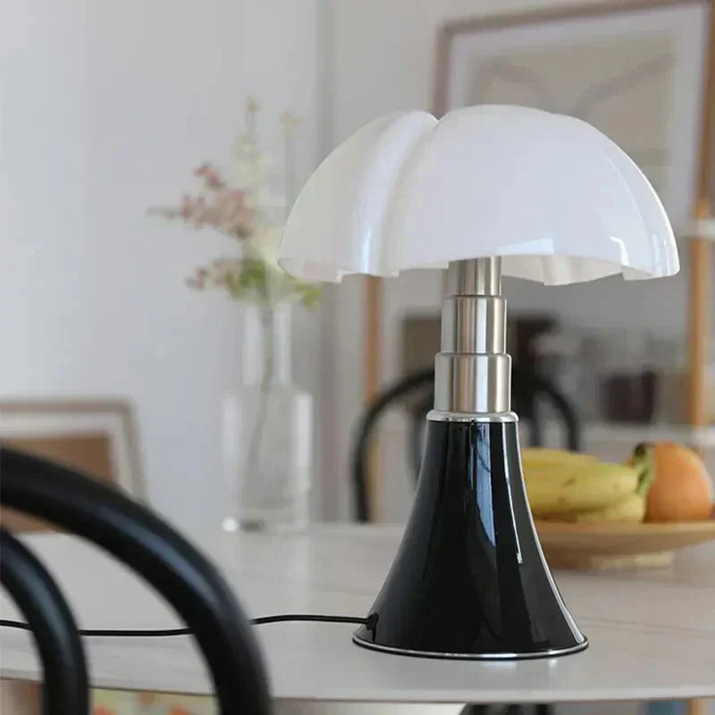 Fitlybuy FloraLuxe floral-shaped white glass table lamp with a black base on a dining table.