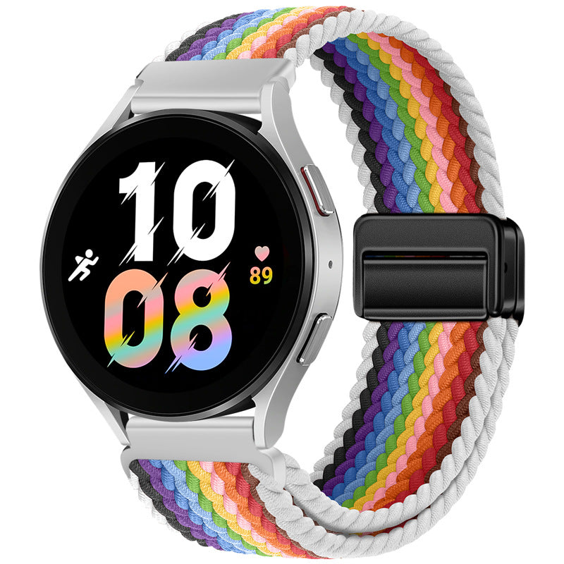 Fitlybuy rainbow woven nylon magnetic watch strap on a silver smartwatch with a digital display.