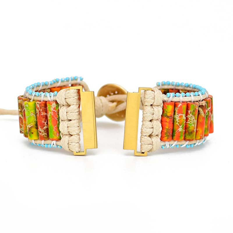 Fitlybuy bracelet watch with multi-colored natural stone cylinders, woven cream band, and gold accents on white background.