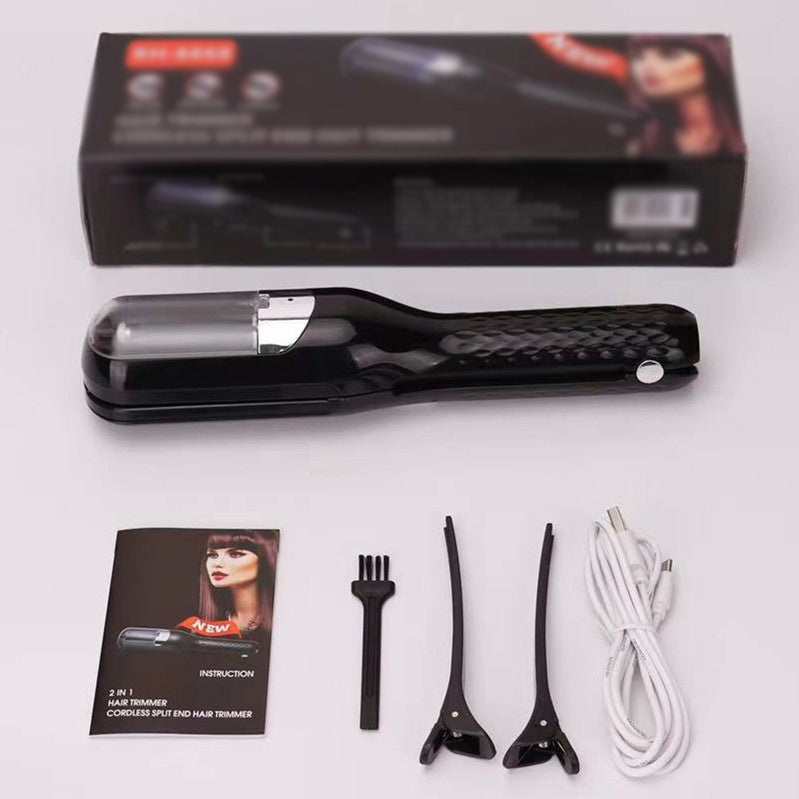 Black Fitlybuy split-end trimmer with box, manual, cleaning brush, two hair clips, and a white charging cable.
