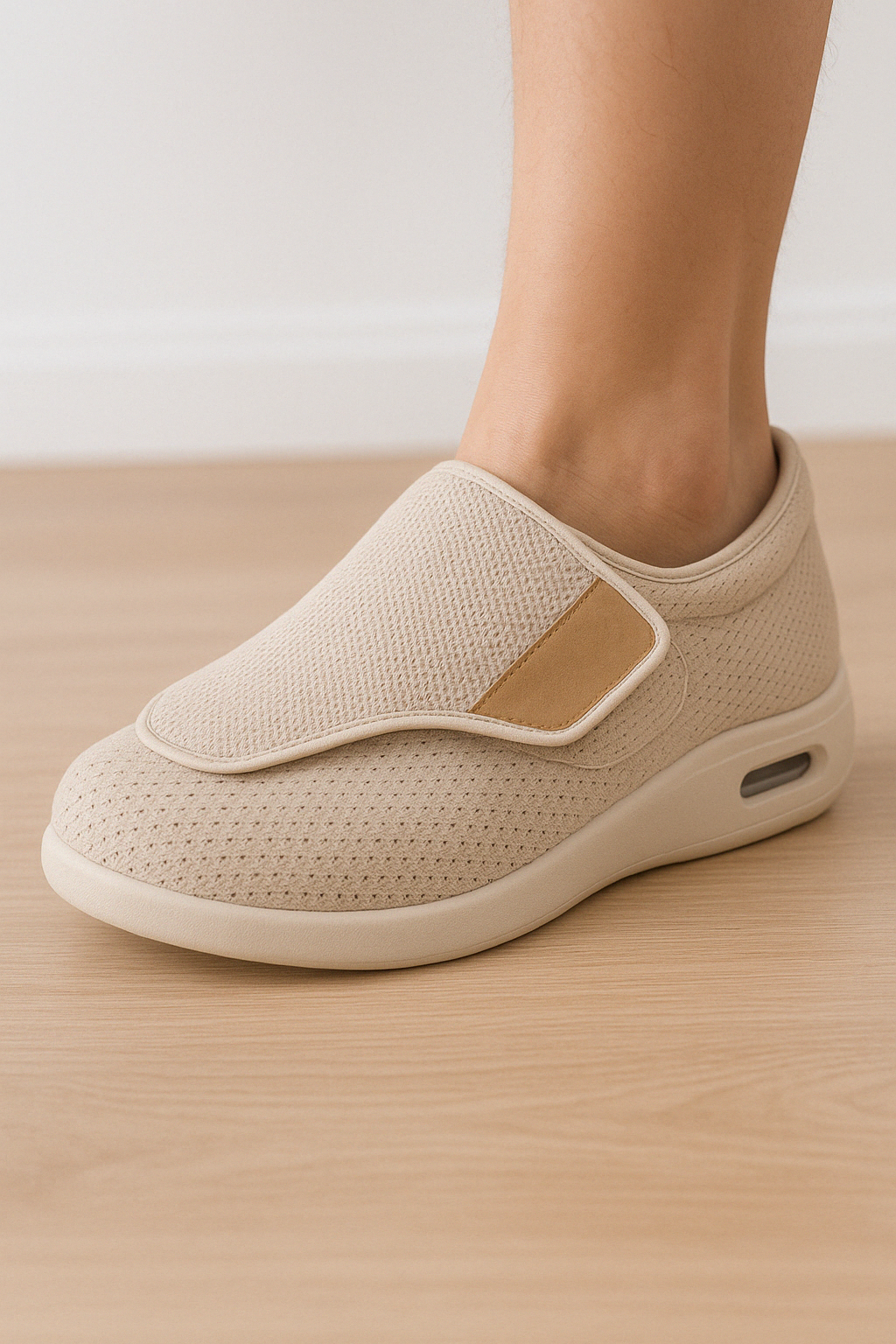 Beige Fitlybuy ComfortStride orthopedic walking shoe with a breathable mesh upper, velcro strap, and cushioned sole.