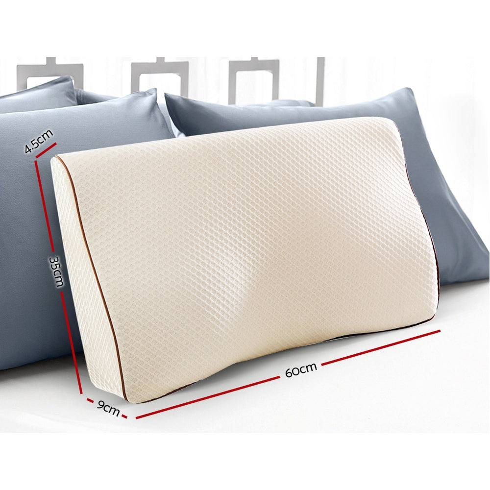 Fitlybuy Dream Align memory foam pillow in beige with textured surface, contoured shape, and dimensions shown on a bed.