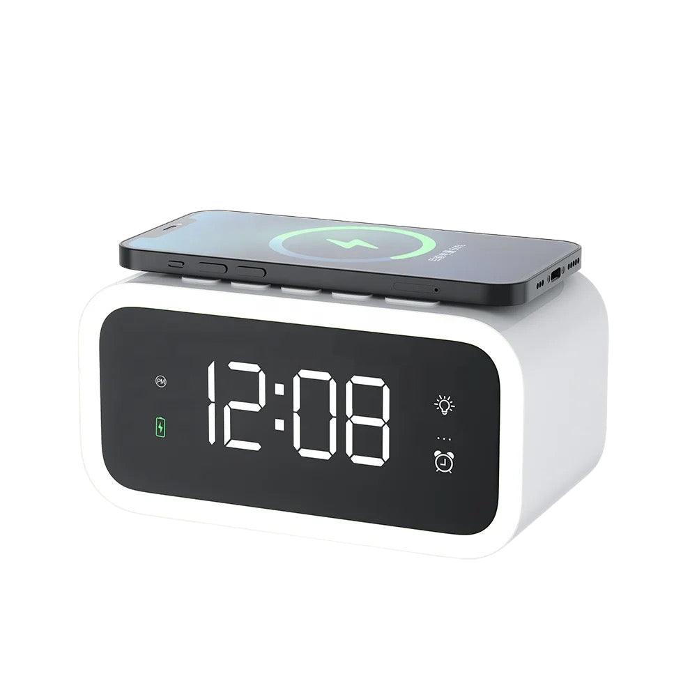 White Fitlybuy 2-in-1 digital alarm clock with wireless charging top, showing 12:08 on a black LED display.