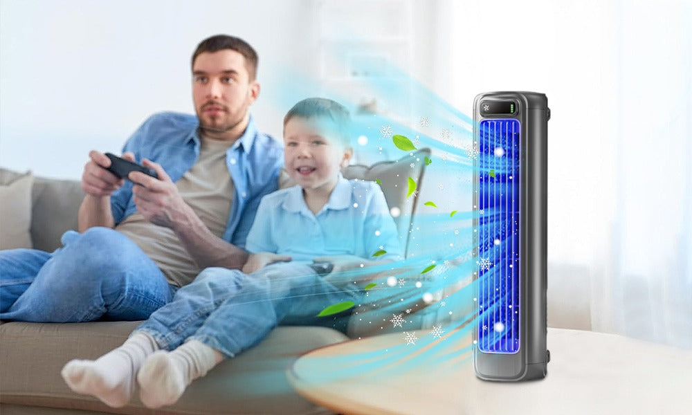 Fitlybuy bladeless grey tower fan blowing cooling air, placed on a table near a father and son playing video games.