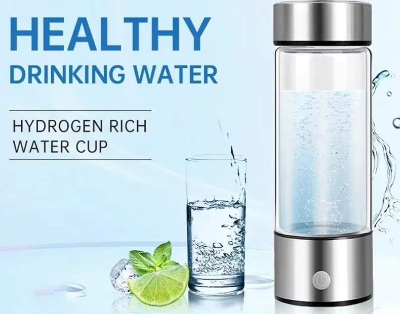 Fitlybuy portable silver and glass hydrogen water bottle with base power button, shown with water and lime garnish.