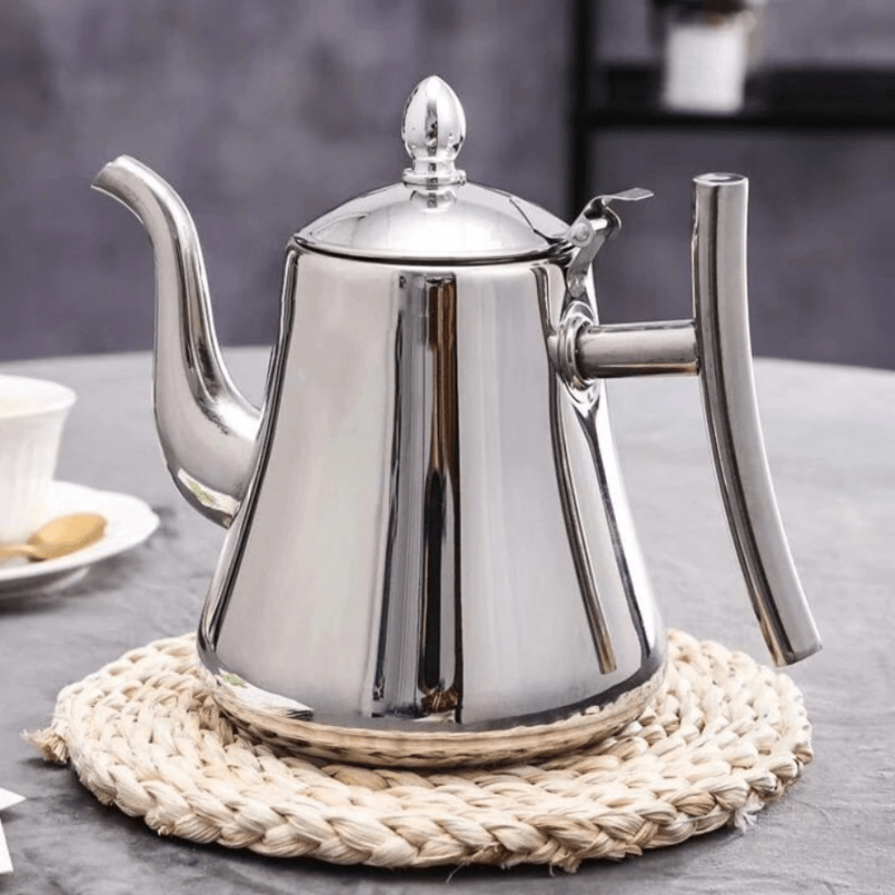 Fitlybuy 1.5L stainless steel induction kettle with filter, polished silver finish, on a round woven mat.