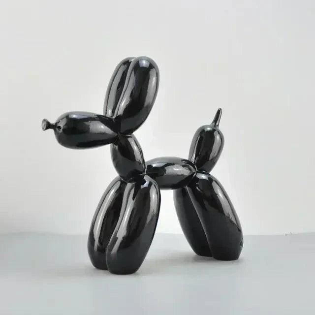 Glossy black balloon dog sculpture with a smooth, playful, modern design for minimalist home decor.