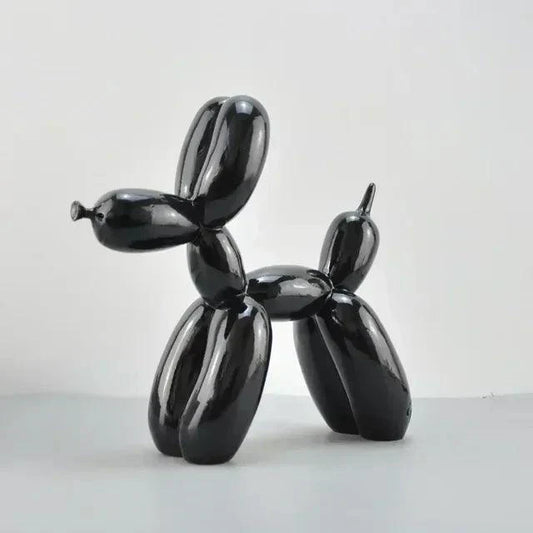 Glossy black balloon dog sculpture with a smooth, playful, modern design for minimalist home decor.