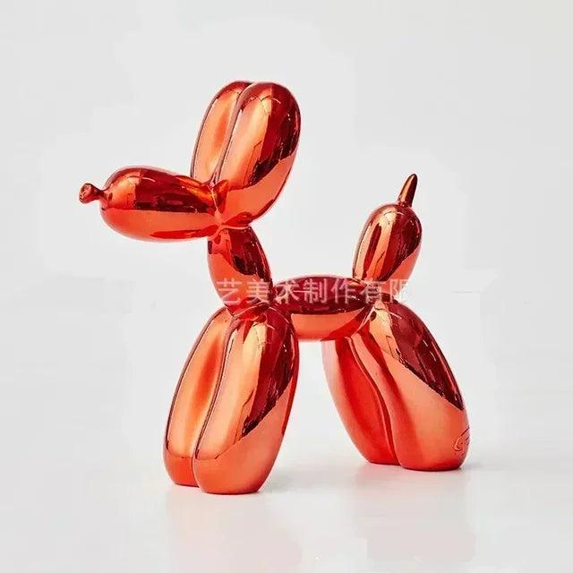 Shiny metallic red balloon dog sculpture, modern playful home decor with a smooth reflective finish on white background.