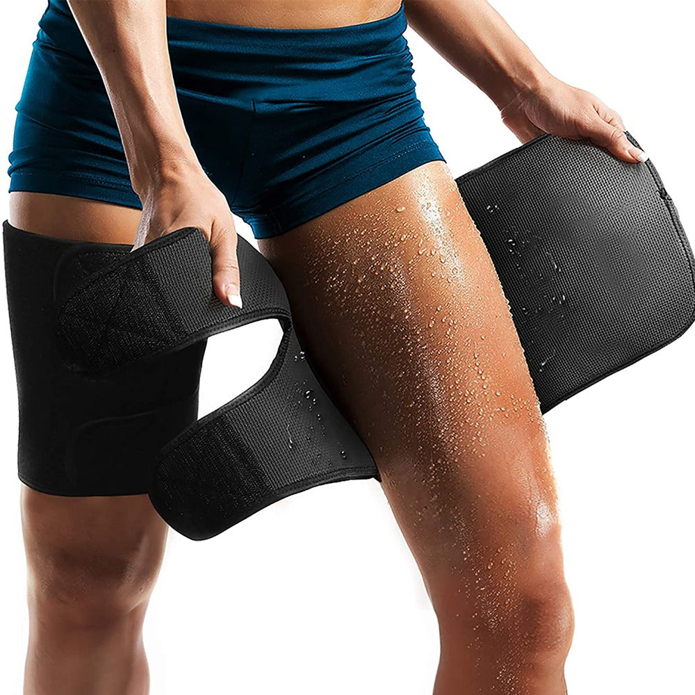 Fitlybuy black adjustable compression thigh brace being applied to a sweaty leg after a workout.