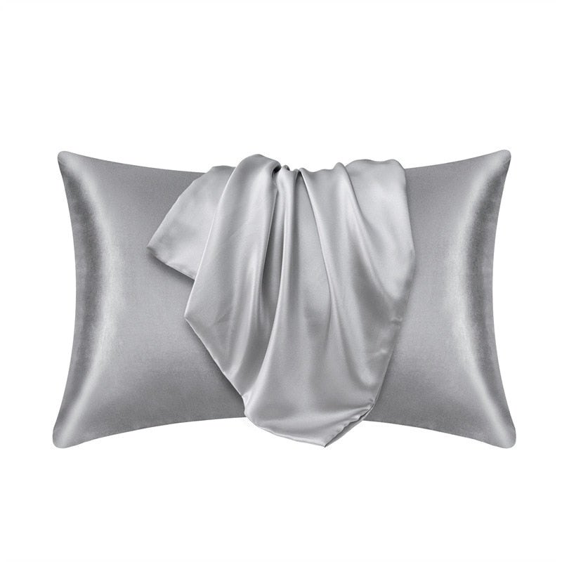 Fitlybuy grey satin pillowcase with SoftTouch fabric, featuring a smooth, draped texture against a white background.