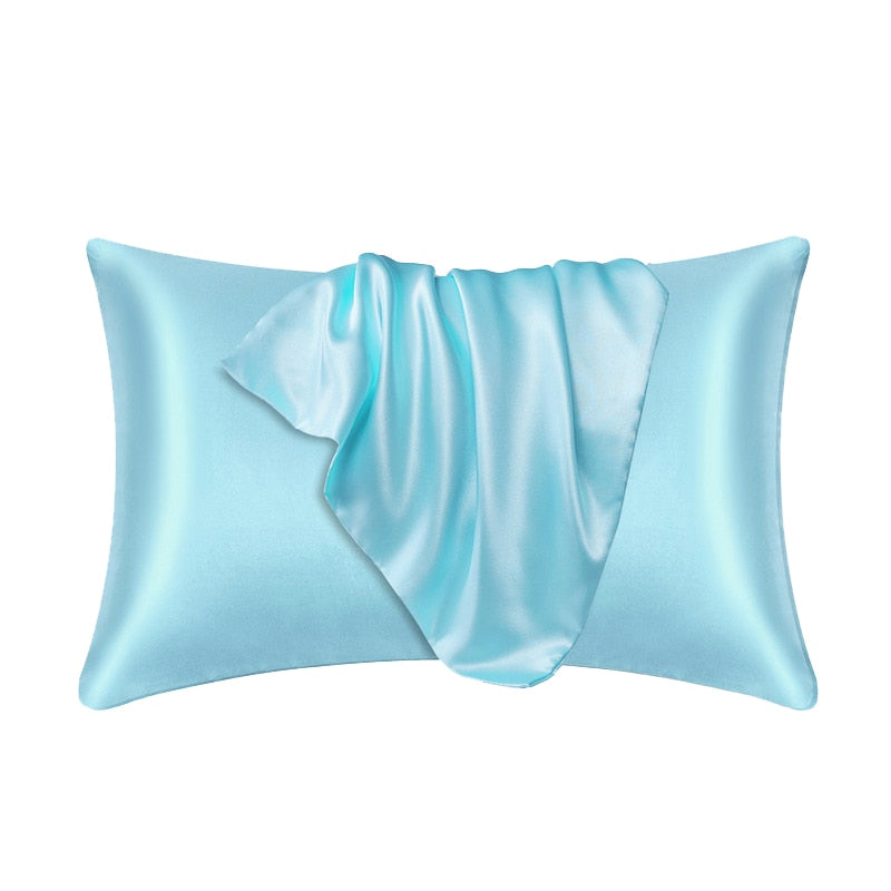 Fitlybuy light blue satin pillowcase with soft, lustrous, draped fabric finish against a white background.