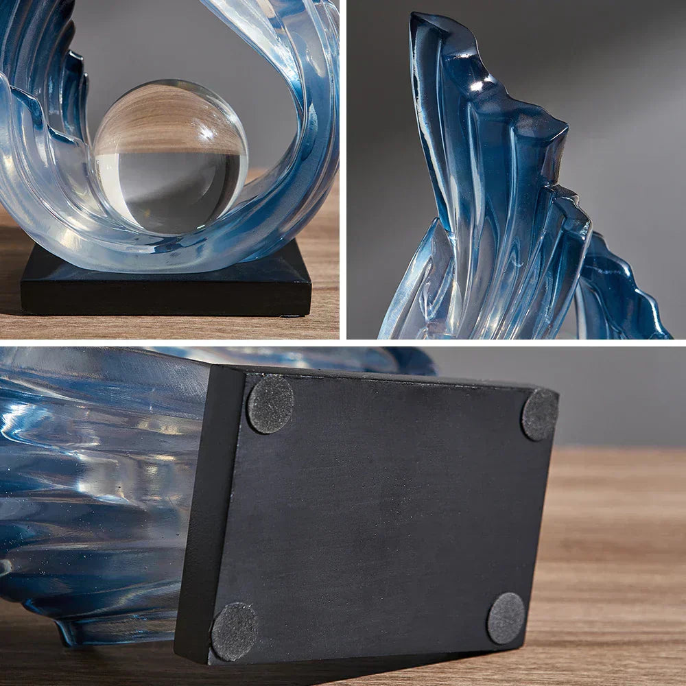 Fitlybuy Ethereal Flow blue glass sculpture with wave design, clear crystal sphere, and black base with grip pads.