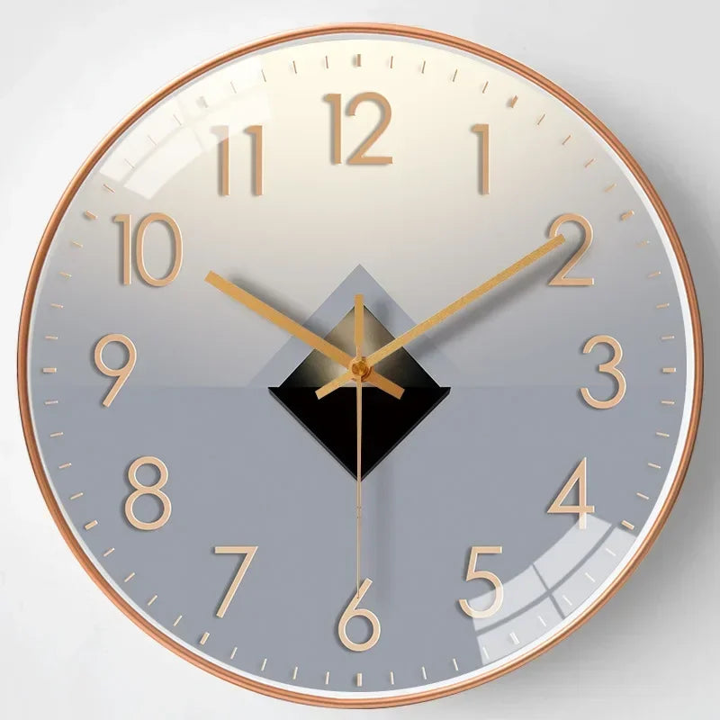 Fitlybuy silent wall clock with a gold frame, grey gradient face, gold numerals, and a central diamond pattern.