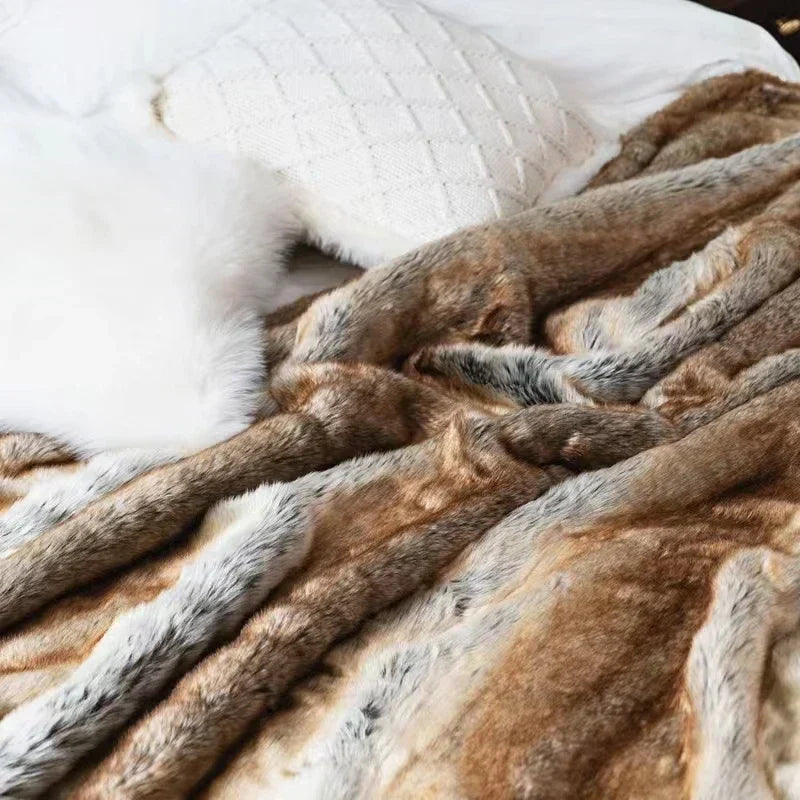 Fitlybuy luxurious brown and grey mink faux fur throw blanket draped over a white bed with decorative pillows.