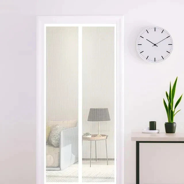 Fitlybuy white magnetic mesh fly screen door installed in a home doorway, providing hands-free insect protection.