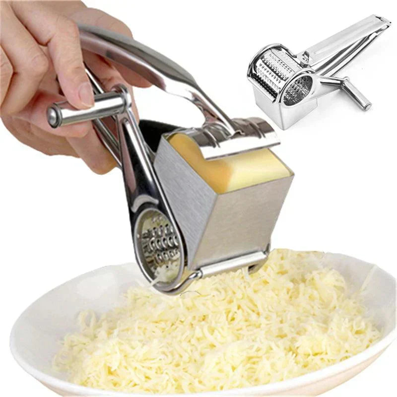 Fitlybuy stainless steel rotary cheese grater in use, grating a block of cheese into a white bowl.