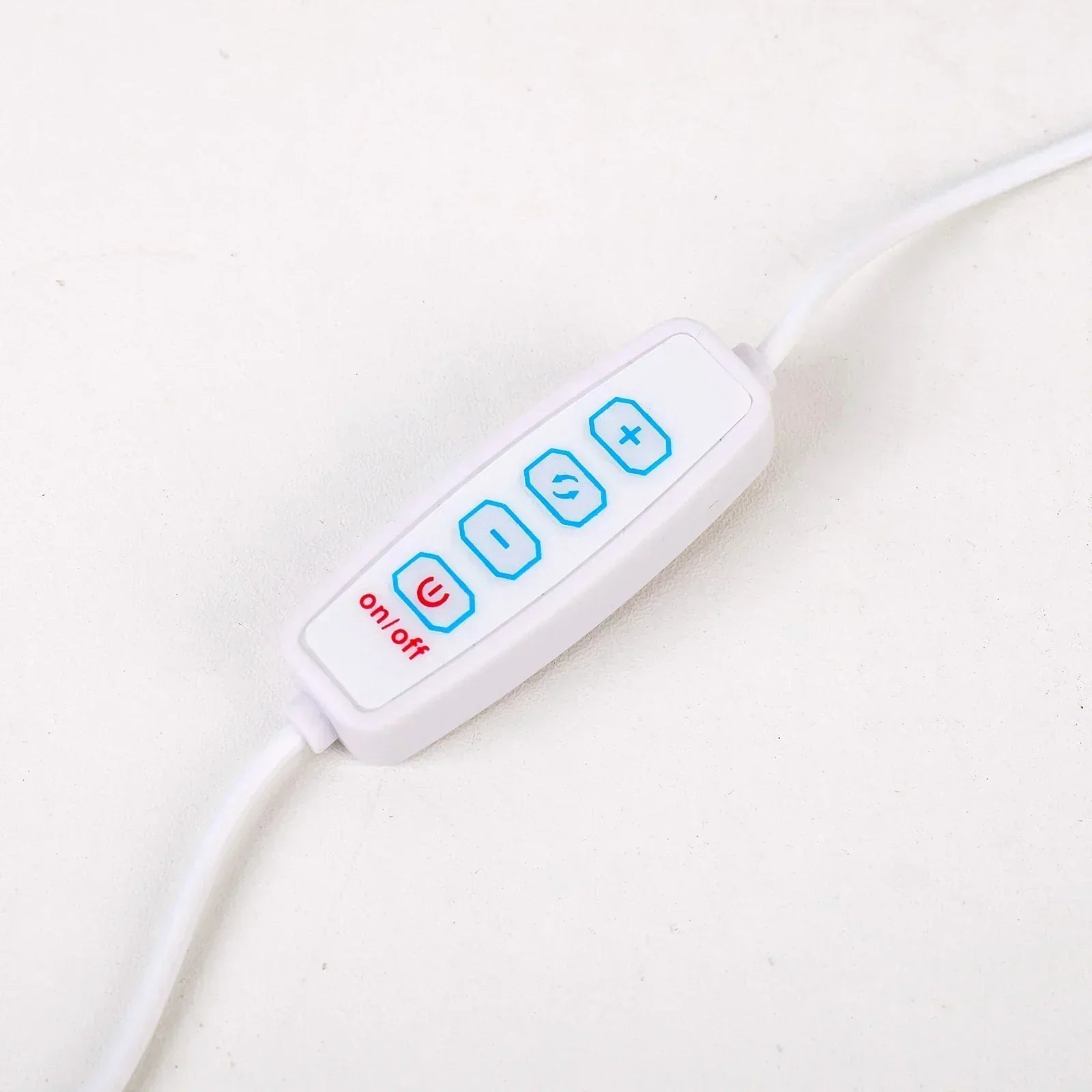 White inline remote control for Fitlybuy AuraStone lamp with power, brightness, and mode buttons on a white background.