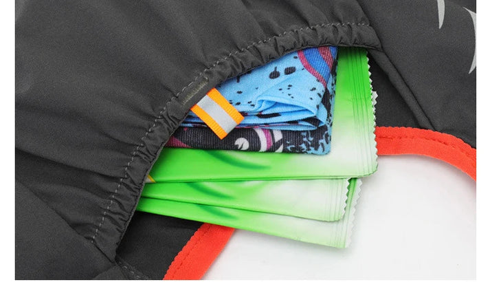 Close-up of a black Fitlybuy hydration vest pocket holding green pouches and folded blue fabric.
