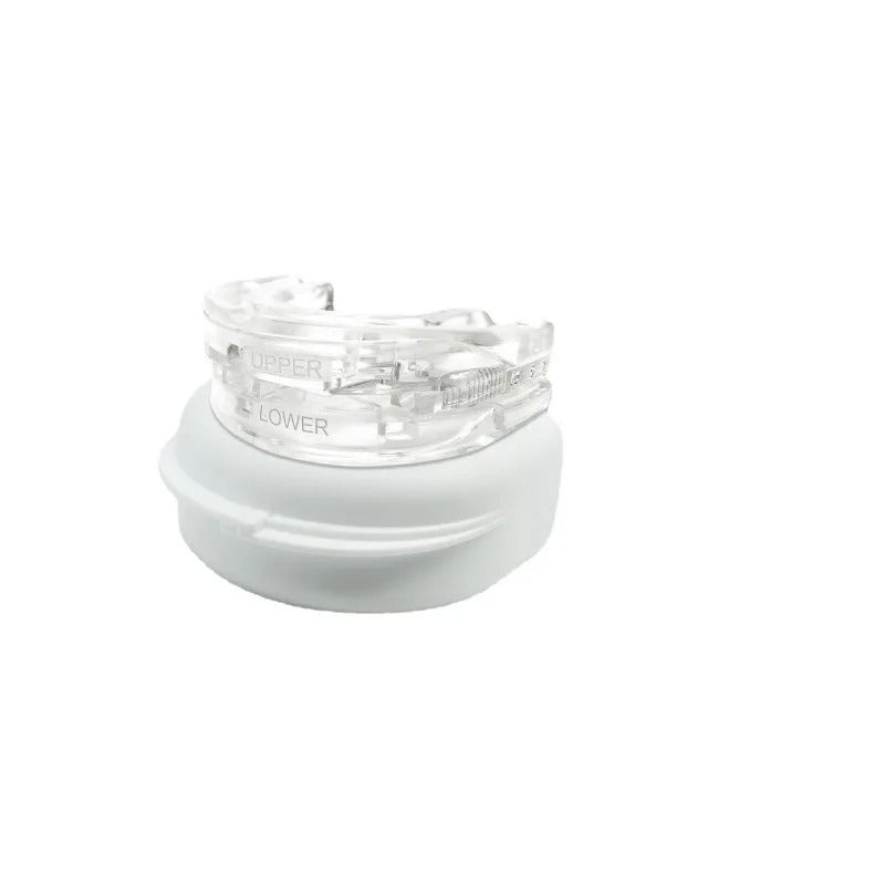 Clear Fitlybuy anti-snoring mouth guard with labeled upper and lower trays, resting on a white storage case.