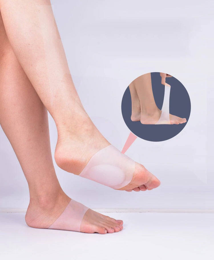 Beige silicone arch support insoles worn on feet to provide flat foot relief and ComfortFlex cushioning.