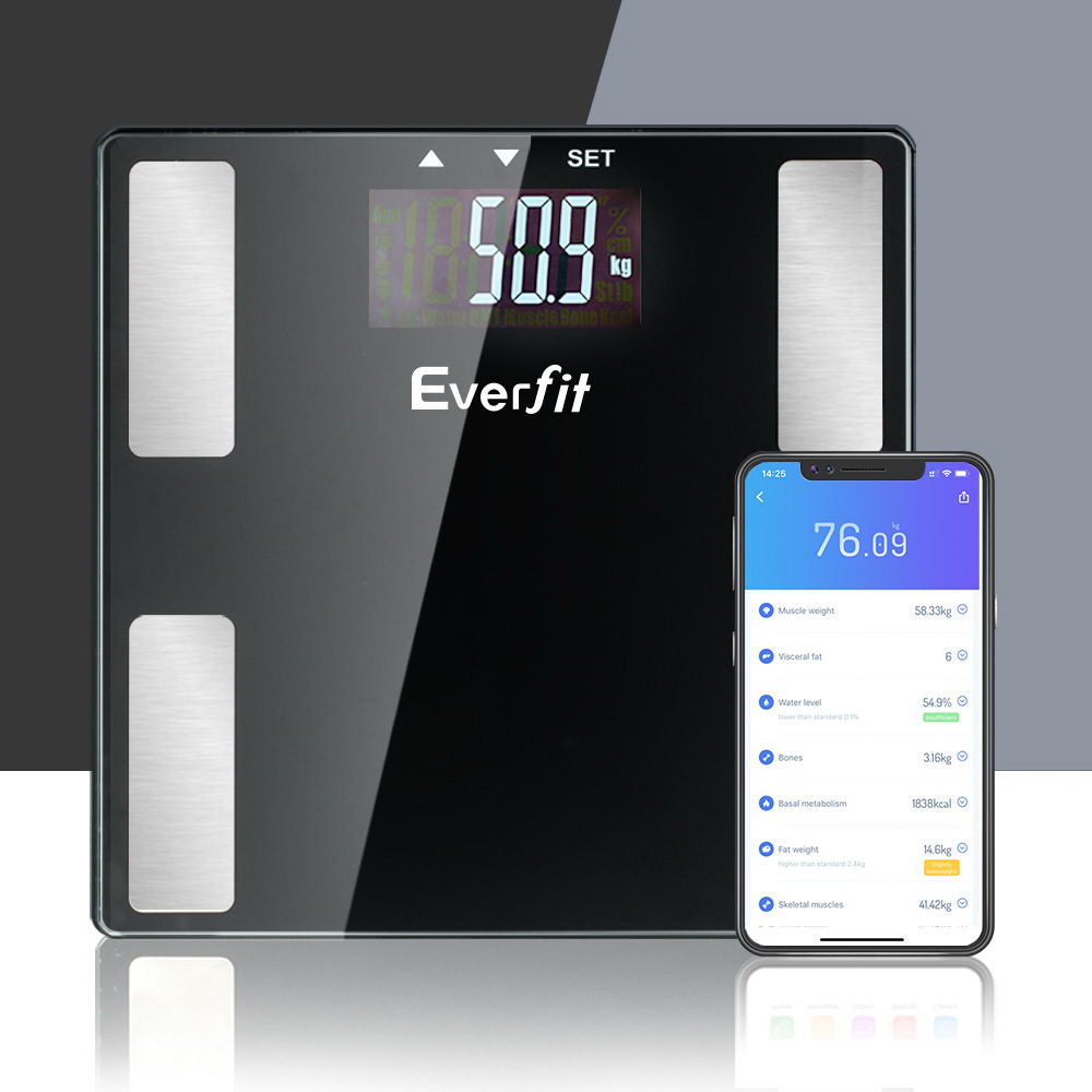 Black Everfit smart scale with metal sensors and digital display next to a smartphone showing body metric health data.