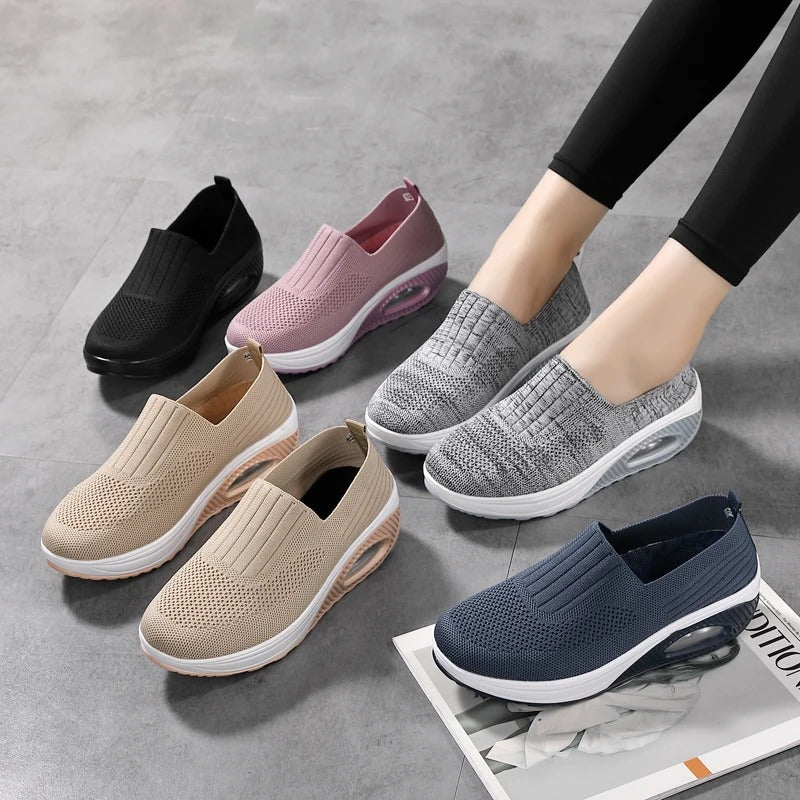 Fitlybuy orthopedic slip-on sneakers in various colors with mesh knit, white platform soles, and ComfortGrip support.