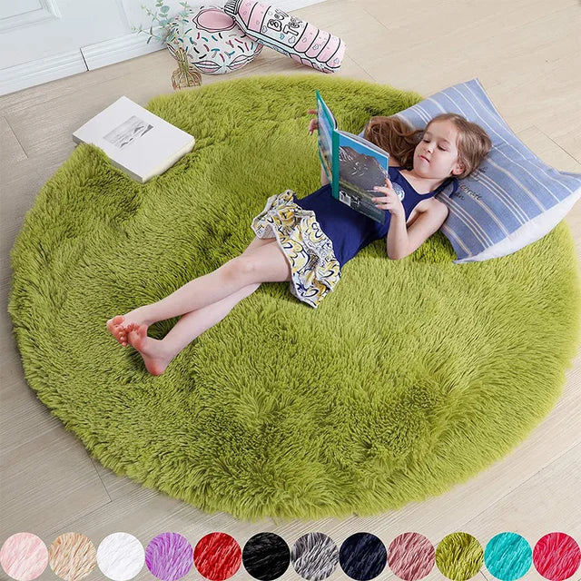 A child reads on a round, lime green Fitlybuy FluffyMat plush rug, featuring CozyCloud Comfort Technology.