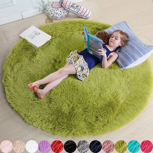 A child reads on a round, lime green Fitlybuy FluffyMat plush rug, featuring CozyCloud Comfort Technology.