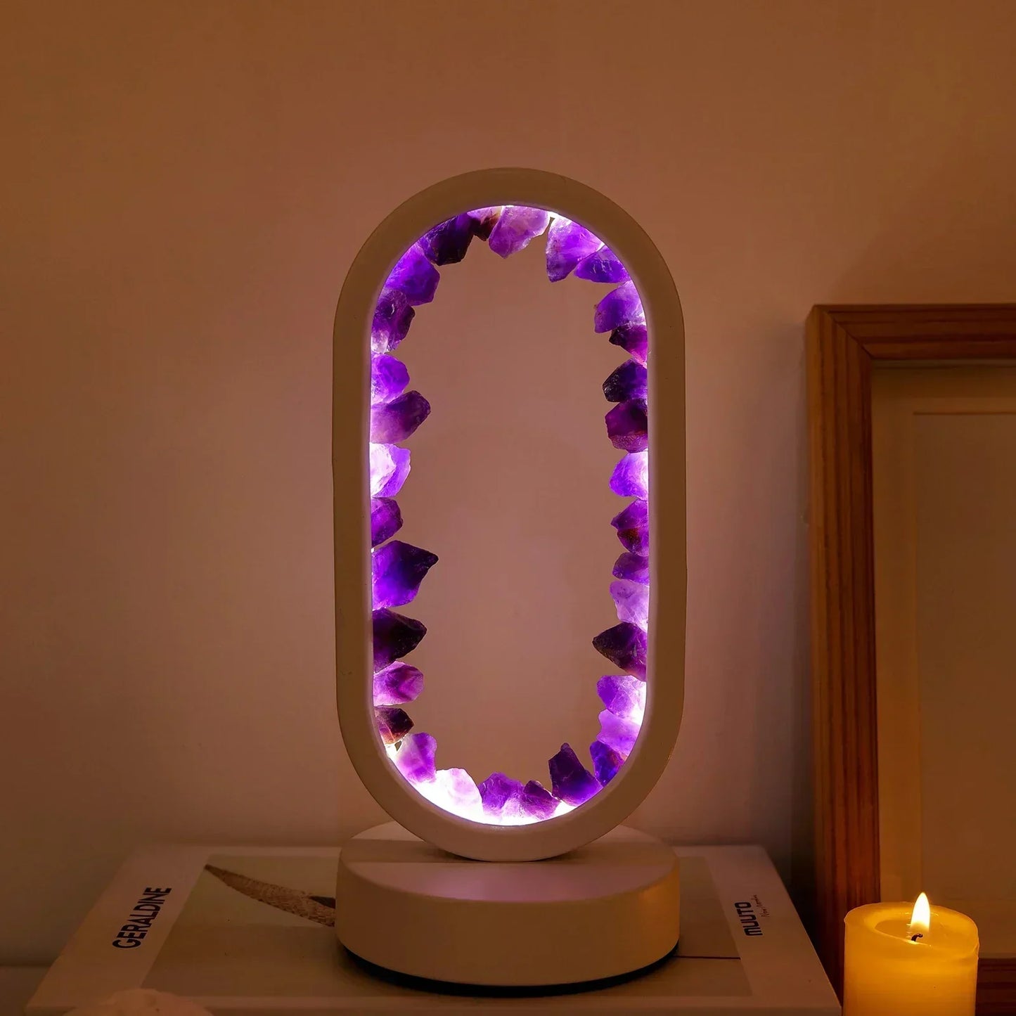 Fitlybuy AuraStone oval lamp with raw purple amethyst crystals, illuminated by soft LED light on a white base.