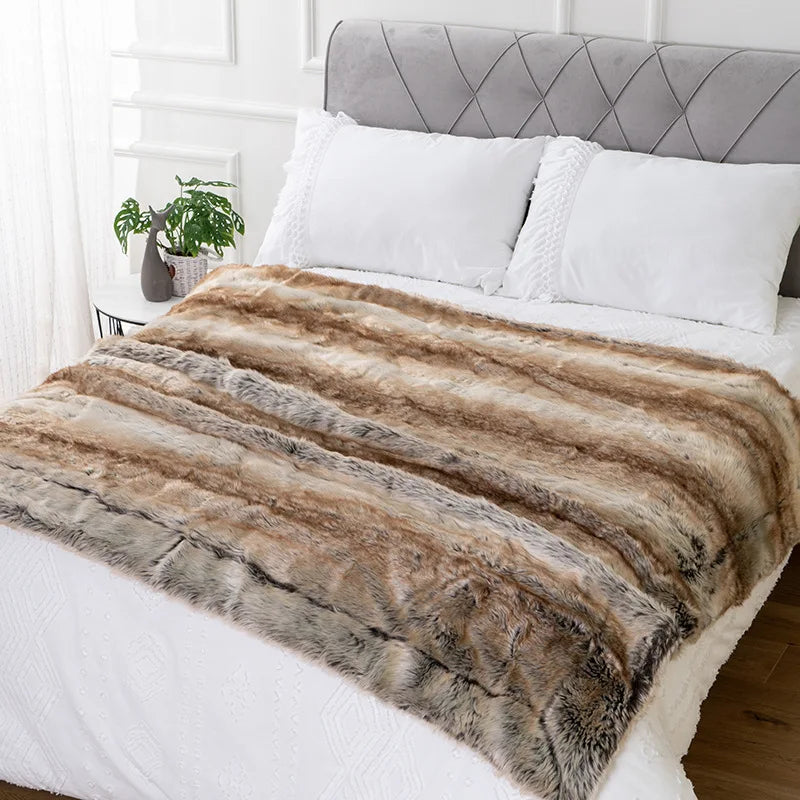 Fitlybuy luxurious mink faux fur throw blanket in brown and grey stripes, styled on a white bed.