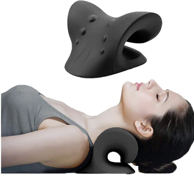 Black ergonomic cervical spine stretch pillow supporting a person’s neck while lying down.