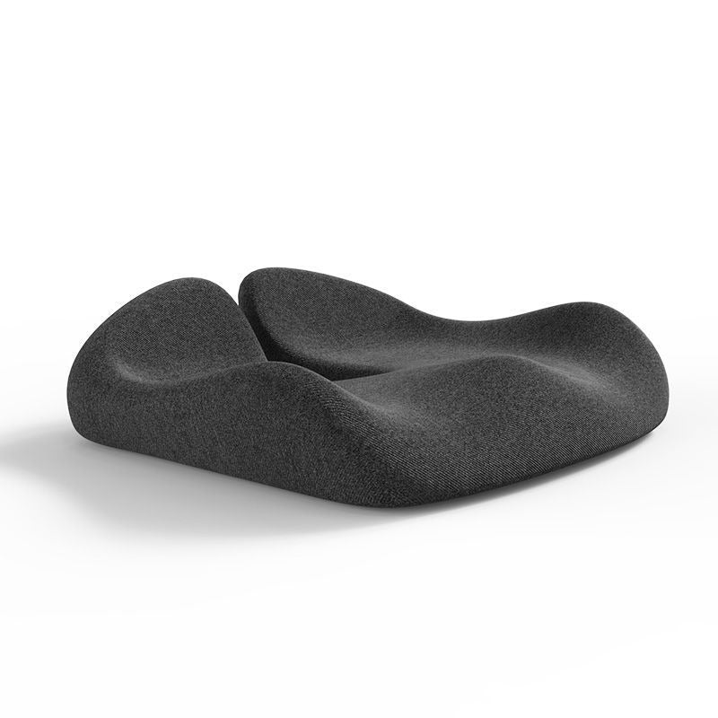 Charcoal grey, ergonomic orthopedic seat cushion with a contoured, wave-like design for sciatica and back pain relief.