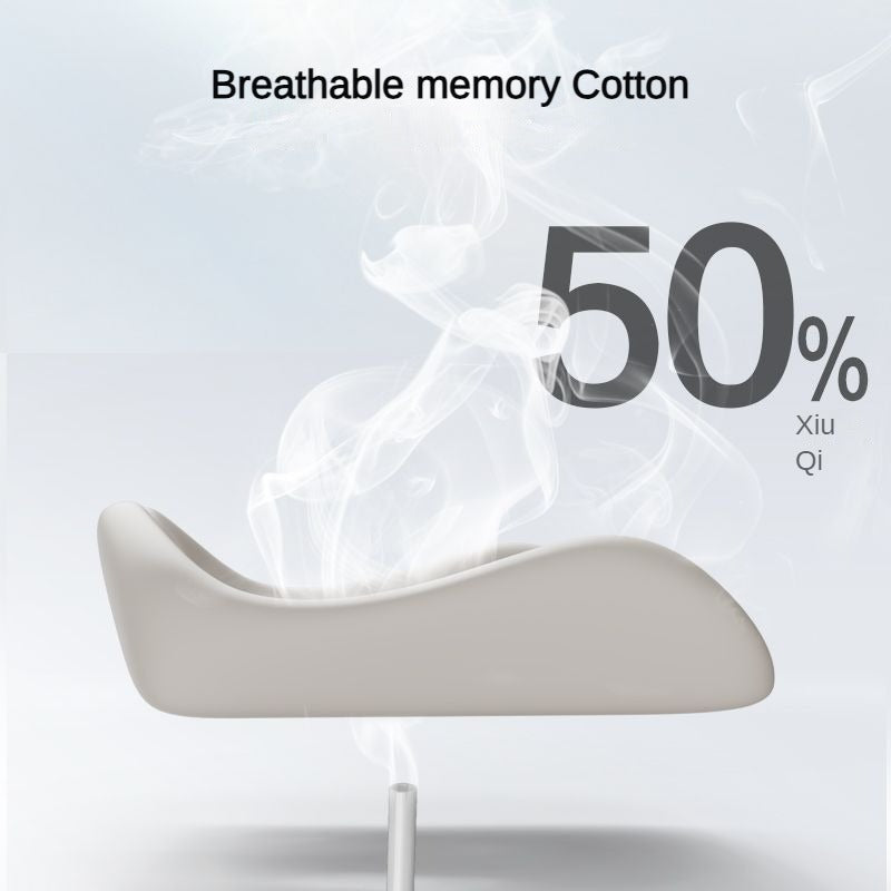 Grey Fitlybuy sciatica memory foam seat cushion with ergonomic contour, shown with vapor to highlight breathability.