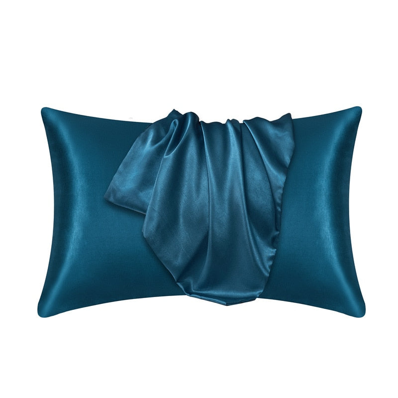 Fitlybuy teal satin pillowcase with SoftTouch fabric, showing a smooth, luxurious, draped texture against a white background.