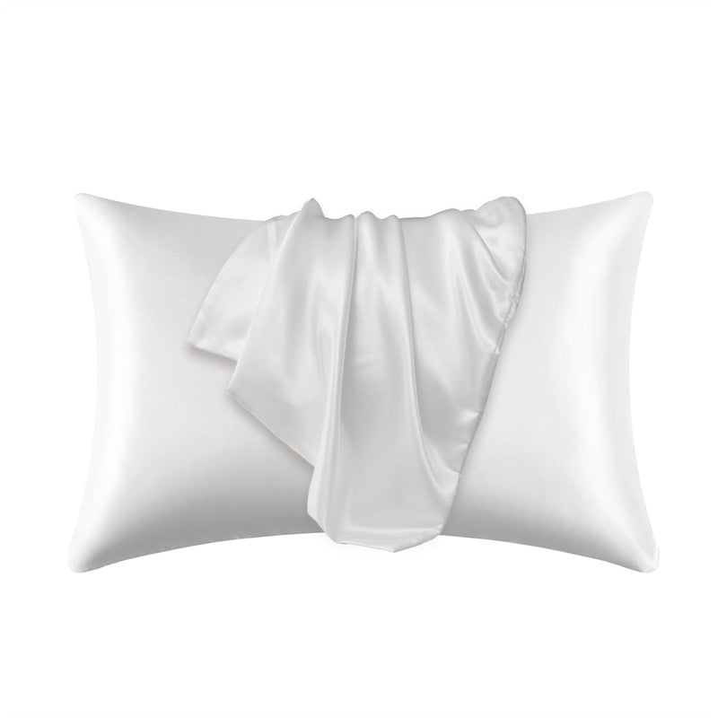 Fitlybuy white satin pillowcase with SoftTouch fabric, featuring a smooth, draped texture isolated on white.
