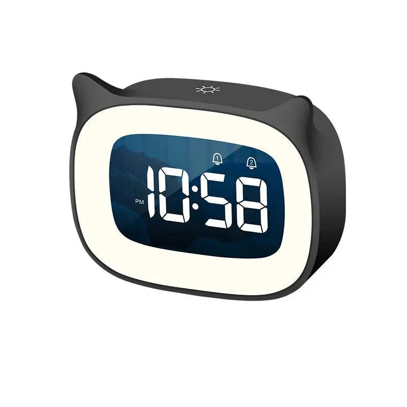 Black cat-ear LED alarm clock with digital 10:58 PM display, dual alarm icons, and built-in night light.
