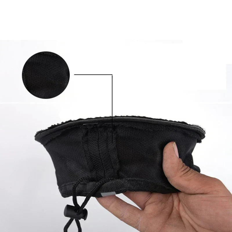 Fitlybuy ComfortRide black gel bike seat cover with adjustable drawstring and textured fabric detail, held by a hand.